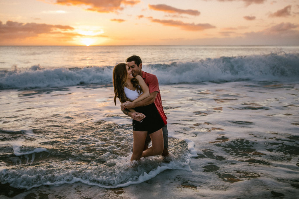 Hawaii water couples session sunset | 4 tips for how to rock your next couples session and family shoot, Mersadi Olson, Hawaii’s best wedding and engagement photographer. This blog post includes outfit tips and ideas, music suggestions, how to feel comfortable in front of the camera and how to pose for your photographer. Book your Hawaiii couples session, family session and wedding and browse the blog for inspiration #tips #photographytips #posingideas #fashion