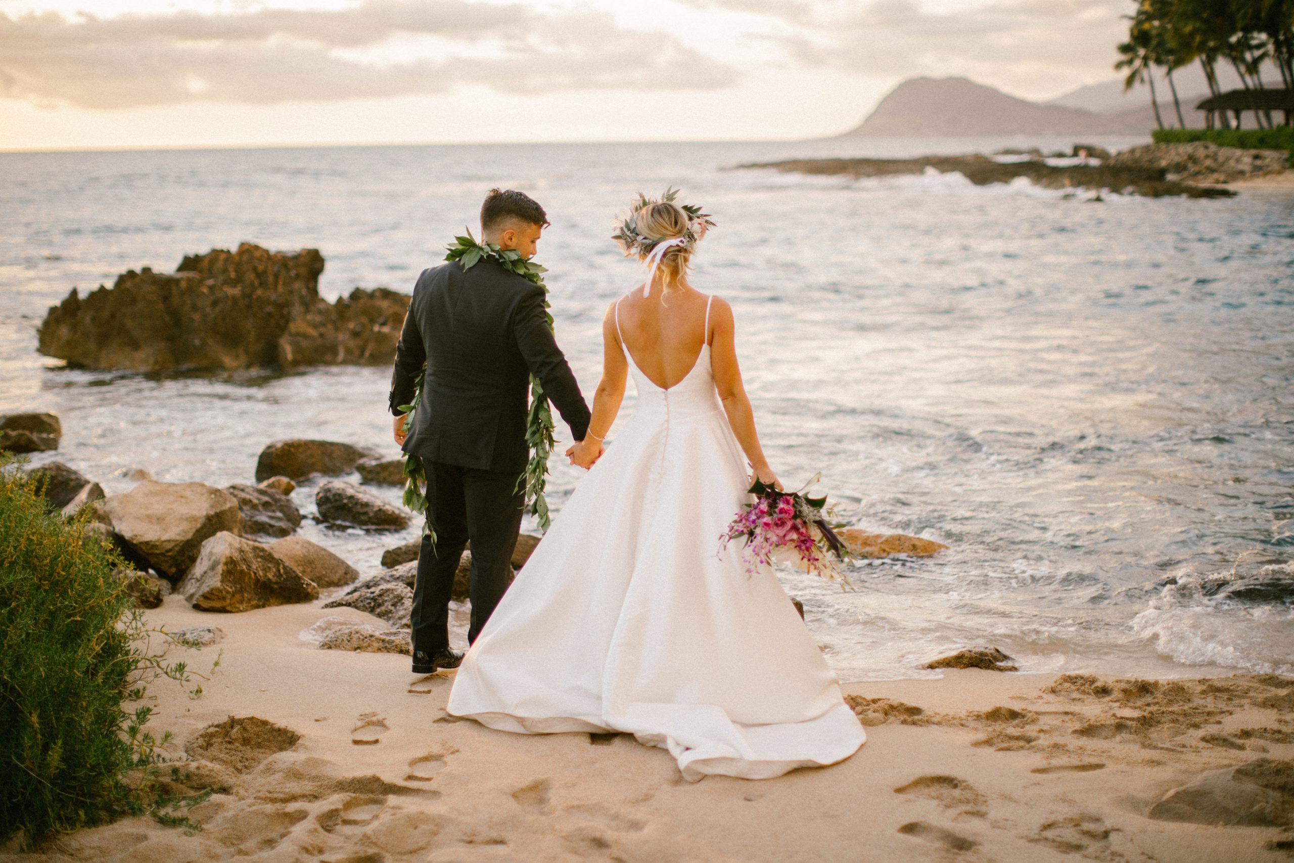 bride and groom on their wedding day at the Four Seasons Oahu in Hawaii
