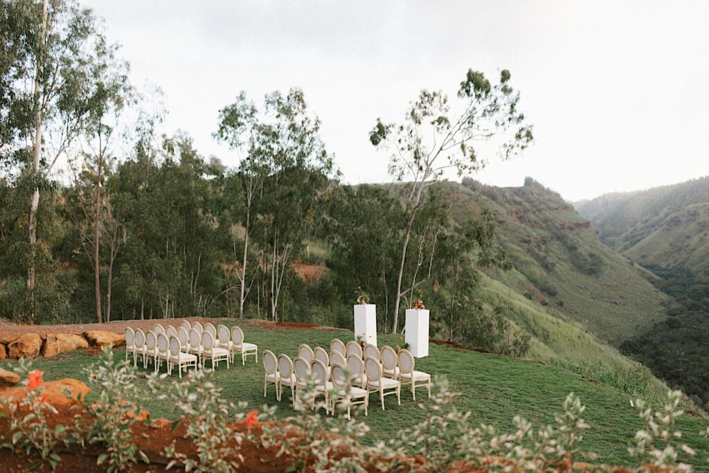Side angle of the wedding ceremony space at Waialua Valley Farms overlooking the mountains.