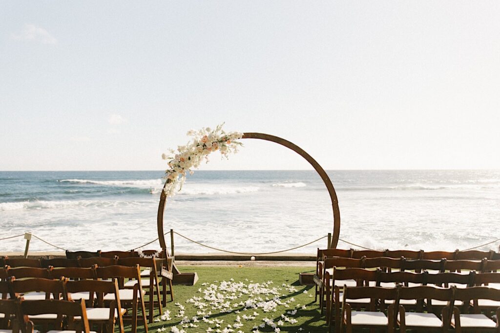 Wedding arch set up overlooking the ocean at the wedding venue Beach House in Kauai