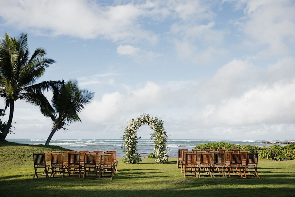 The ceremony space of the wedding venue Loulu Palm on Oahu set up for an LGBTQ wedding ceremony